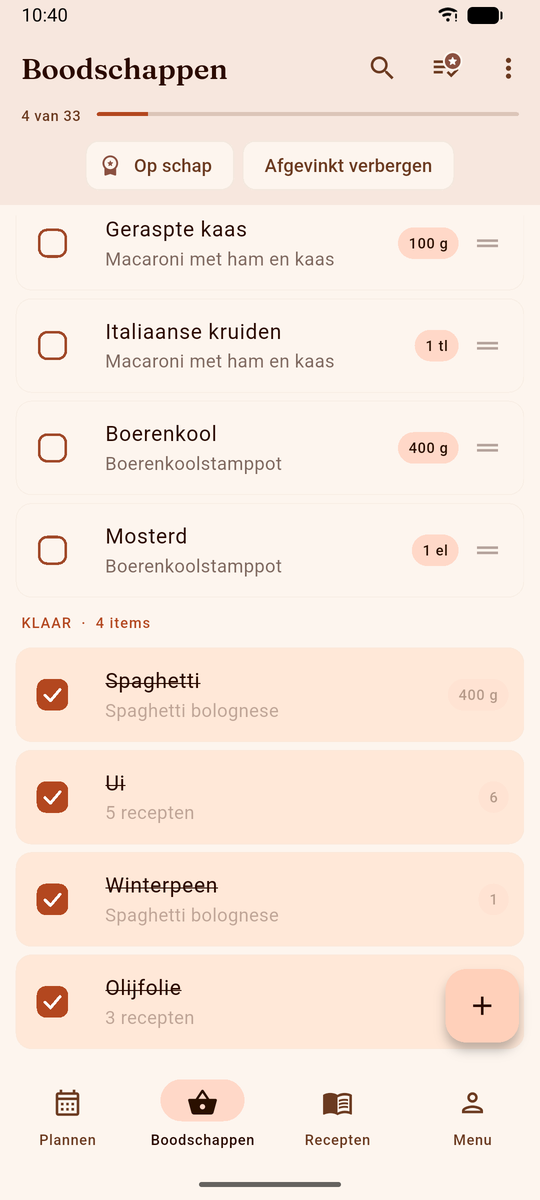 Boodschappenlijst van DinnerFlow halverwege het boodschappen doen, vier afgevinkte regels doorgestreept onder het kopje Klaar en de rest nog te halen